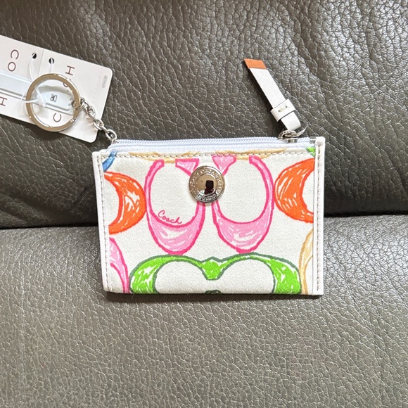 Coach Accessories - Coach mini zip multi color and white fabric case